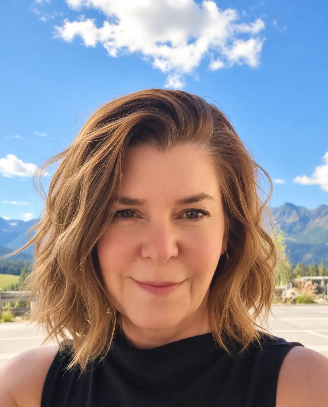 Portrait of Becky Cook with the Seward mountains behind her