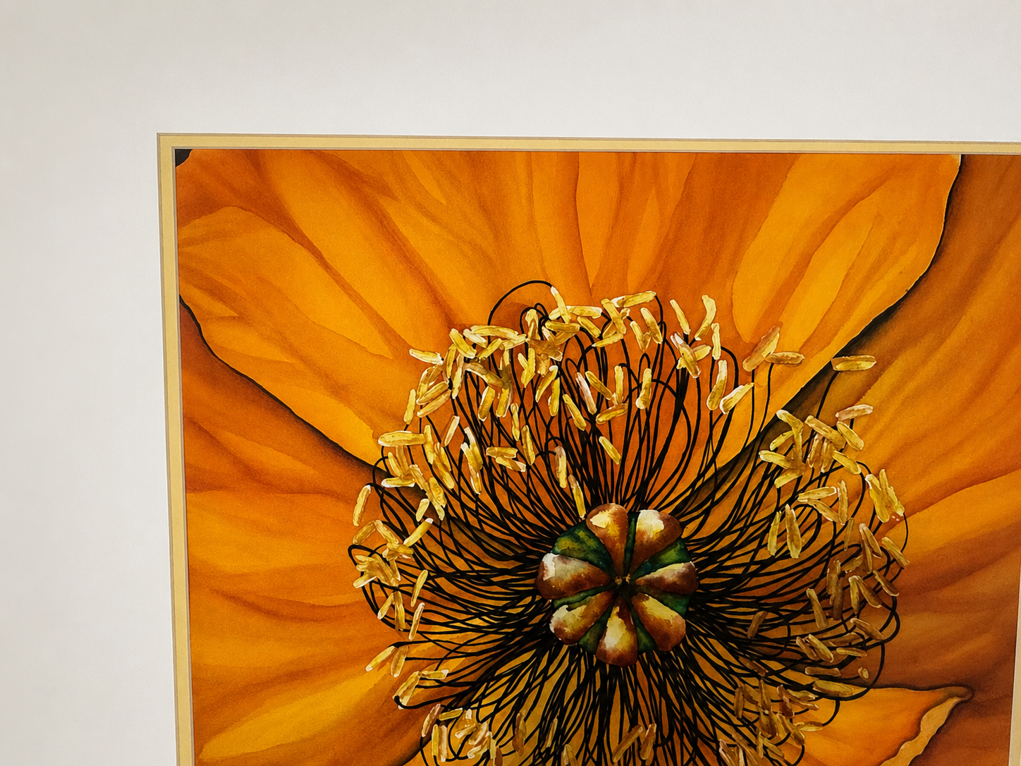Warm orange floral artwork inside Resurrection Spa